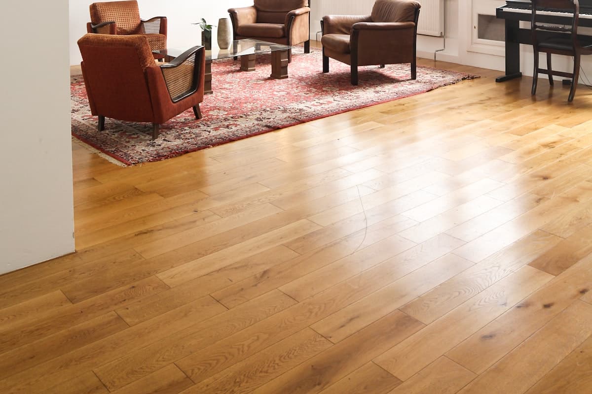 Wide-plank oak flooring in a sunlit room